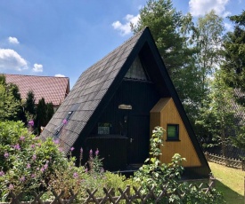 Wooden chalet with oven, in Oberharz near a lake