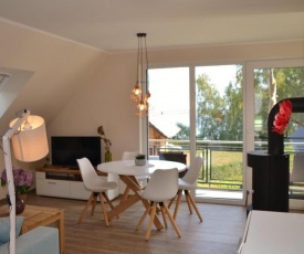 U15 OG - Komfortable Ferienwohnung mit Balkon & Kamin in Röbel an der Müritz